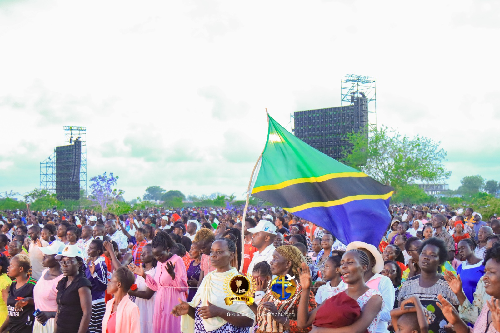 International crowd worship with Tanzania flag